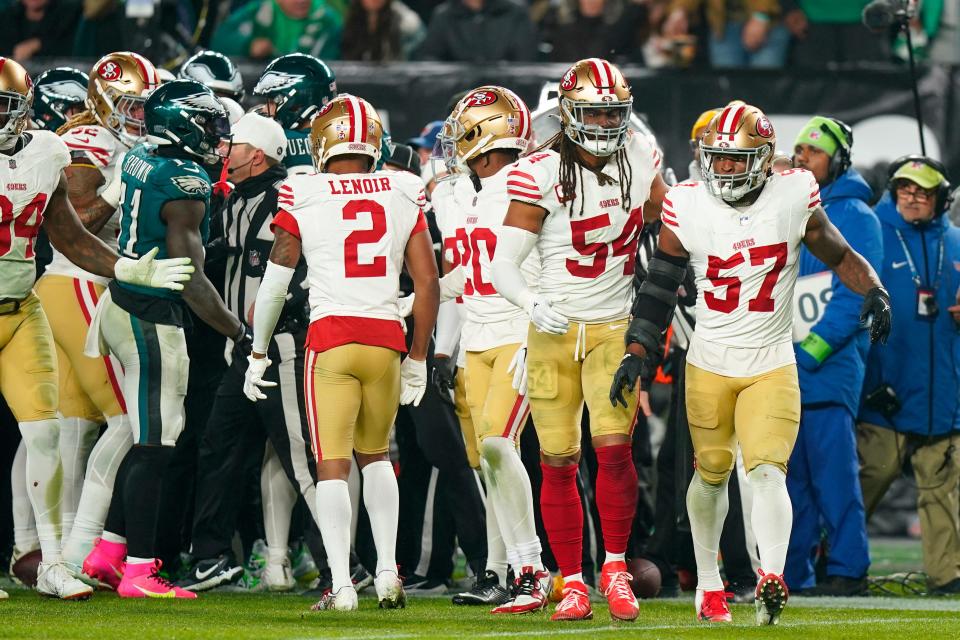 San Francisco 49ers linebacker Dre Greenlaw (57) looks on after an argument with Philadelphia Eagles players during the second half of an NFL football game, Sunday, Dec. 3, 2023, in Philadelphia.