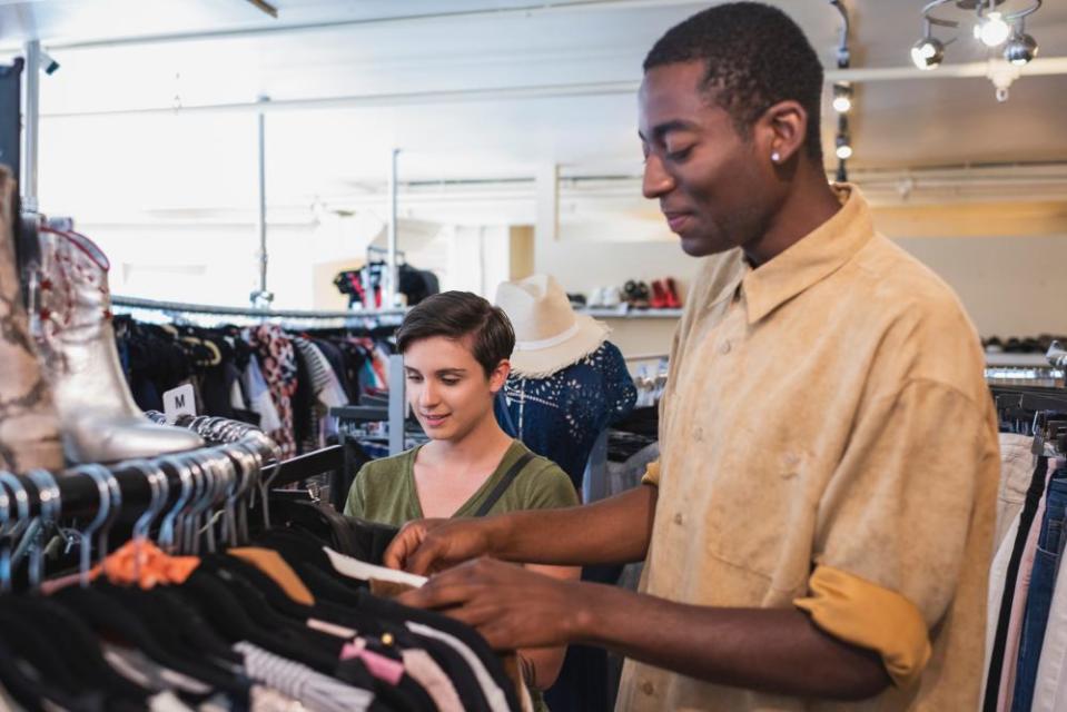 Two friends shopping in vintage boutique