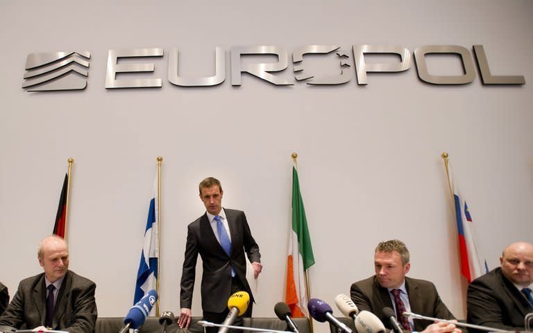 Europol's chief Rob Wainwright (2nd L) arrives for a press conference in The Hague on February 4, 2013. Football on Monday vowed to fight the scourge of match-fixing but warned a joint effort was needed to tackle the problem after police unveiled a massive criminal network that rigged hundreds of top-flight matches