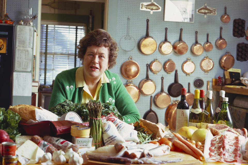 Portrait of American chef, author, cooking teacher, author, and tv host Julia Child (1912 - 2004) as she poses in her kitchen, Cambridge, Massachusetts, 1972. (Photo by Hans Namuth/Photo Researchers History/Getty Images)