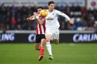 Football Soccer - Swansea City v Southampton - Barclays Premier League - Liberty Stadium - 13/2/16 Swansea's Federico Fernandez in action with Southampton's Shane Long Mandatory Credit: Action Images / Tony O'Brien Livepic