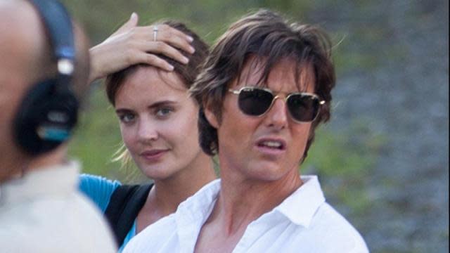 Tom Cruise certainly has a type! The actor was spotted on the set of his new film <em>Mena</em> alongside his young assistant, who bears a striking resemblance to Cruise’s ex-wife Katie Holmes. AKM/GSI <strong>NEWS: Is Scientology Keeping Tom Cruise From Seeing Suri?</strong> The <em>Mission: Impossible</em> actor stars as real-life drug smuggler Barry "El Gordo" Seal in the new true crime film, and his assistant has been by his side as the production films through the hot Atlanta summer. AKM/GSI <strong>NEWS: It's Been 10 Years Since Tom Cruise Jumped on Oprah's Couch</strong> Holmes told <em>People</em> last year that she doesn’t want her marriage to Cruise to define her, saying "I don't want that to be what I'm known as." However, if rumors of a flirtation between the action star and his assistant are to be believed, it seems he might not be as over the relationship as his ex-wife. <strong>WATCH: Tom Cruise Goes Shirtless, Hangs Off a Plane in 'Mission: Impossible Rogue Nation' Trailer</strong> Check out Cruise’s death defying stunt work for the latest <em>Mission: Impossible</em> installment in the video below!