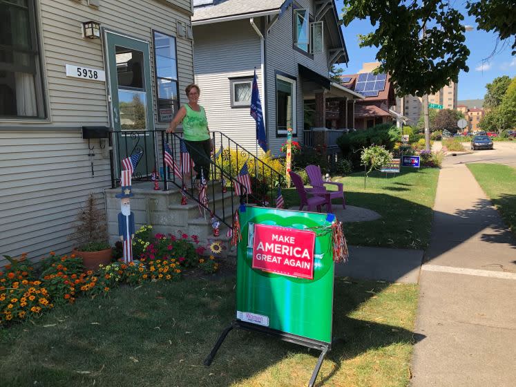 KENOSHA, WISCONSIN SEPTEMBER 3. 2020 - Mary Morgan initially posted her Trump sign and flag at the edge of her lawn, but moved it back at the request of her neighbors, "because we're friends." They maintained peace by avoiding political discussions. (Molly Hennessy-Fiske / Los Angeles Times)