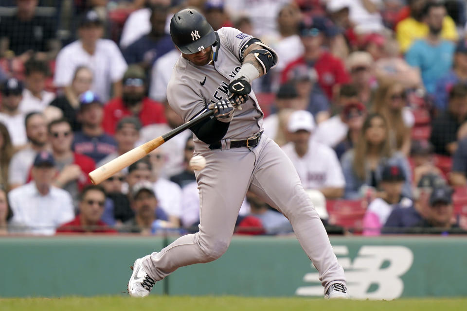 New York Yankees' Gleyber Torres hits a two-run single in the sixth inning in the first baseball game of a doubleheader against the Boston Red Sox, Tuesday, Sept. 12, 2023, in Boston. (AP Photo/Steven Senne)