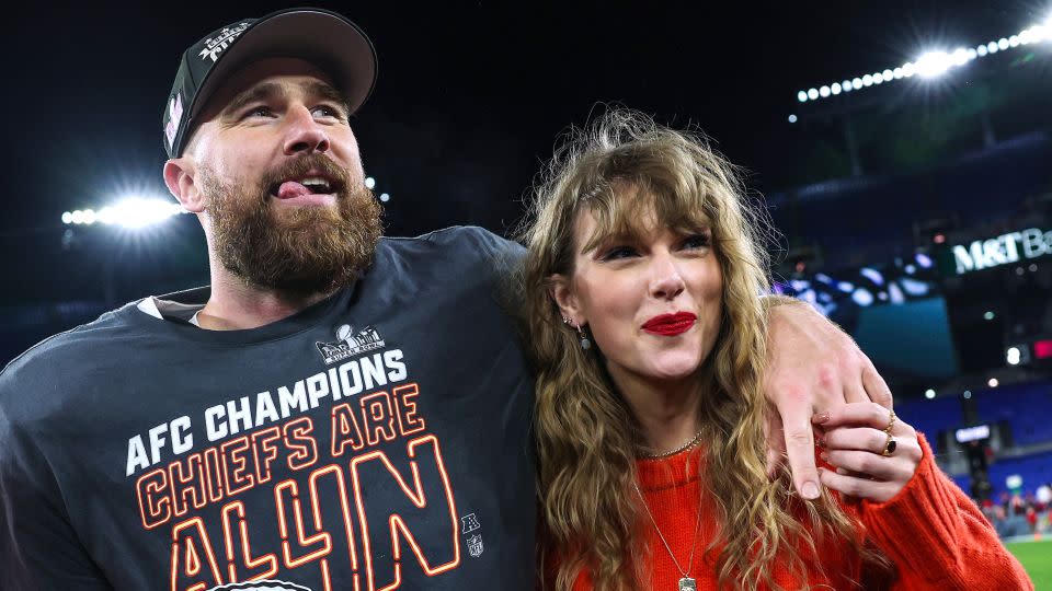 Travis Kelce #87 of the Kansas City Chiefs (L) celebrates with Taylor Swift after defeating the Baltimore Ravens in the AFC Championship Game at M&T Bank Stadium on January 28, 2024 in Baltimore, Maryland. - Patrick Smith/Getty Images