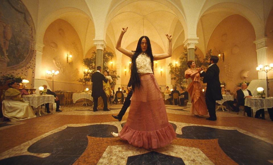 Bella in a dance room in a scene from "Poor Things"