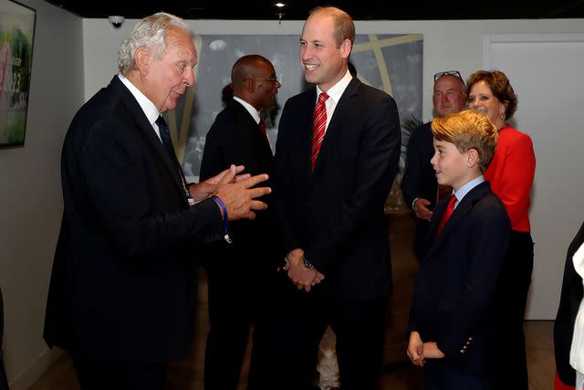 <p>Henry Browne - World Rugby/World Rugby via Getty Images</p> Sir Bill Beaumont speaks to Prince William and Prince George at the Rugby World Cup France 2023 on October 14