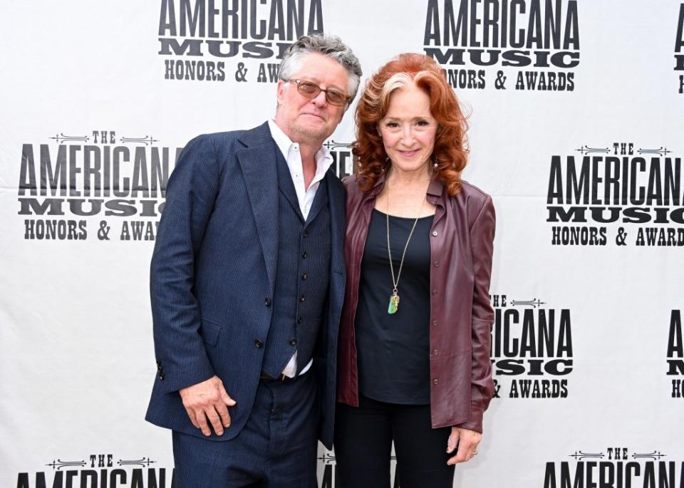 Jed Hilly and Bonnie Raitt at The Americana Music Association 22nd Annual Honors & Awards Show on September 20, 2023 at the Ryman Auditorium in Nashville, Tennessee.