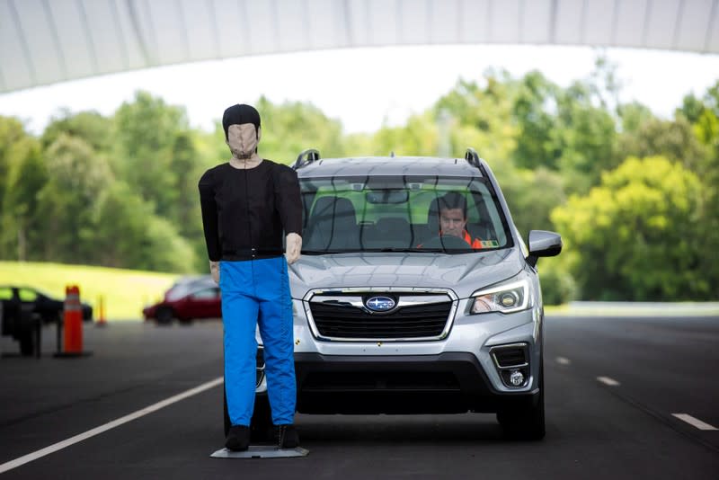 FILE PHOTO: IIHS technician Floyd demonstrates pedestrian crash prevention test on Subaru Forester at IIHS-HLDI Vehicle Research Center in Ruckersville, Virginia