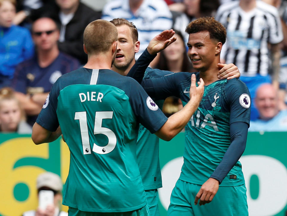 Dele Alli celebrates with Harry Kane and Eric Dier after putting Tottenham 2-1 up in the north east