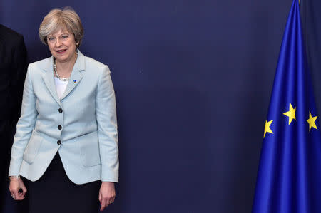 Britain's Prime Minister Theresa May poses for a family picture at the Eastern Partnership summit at the European Council Headquarters in Brussels, Belgium, November 24, 2017. REUTERS/Eric Vidal