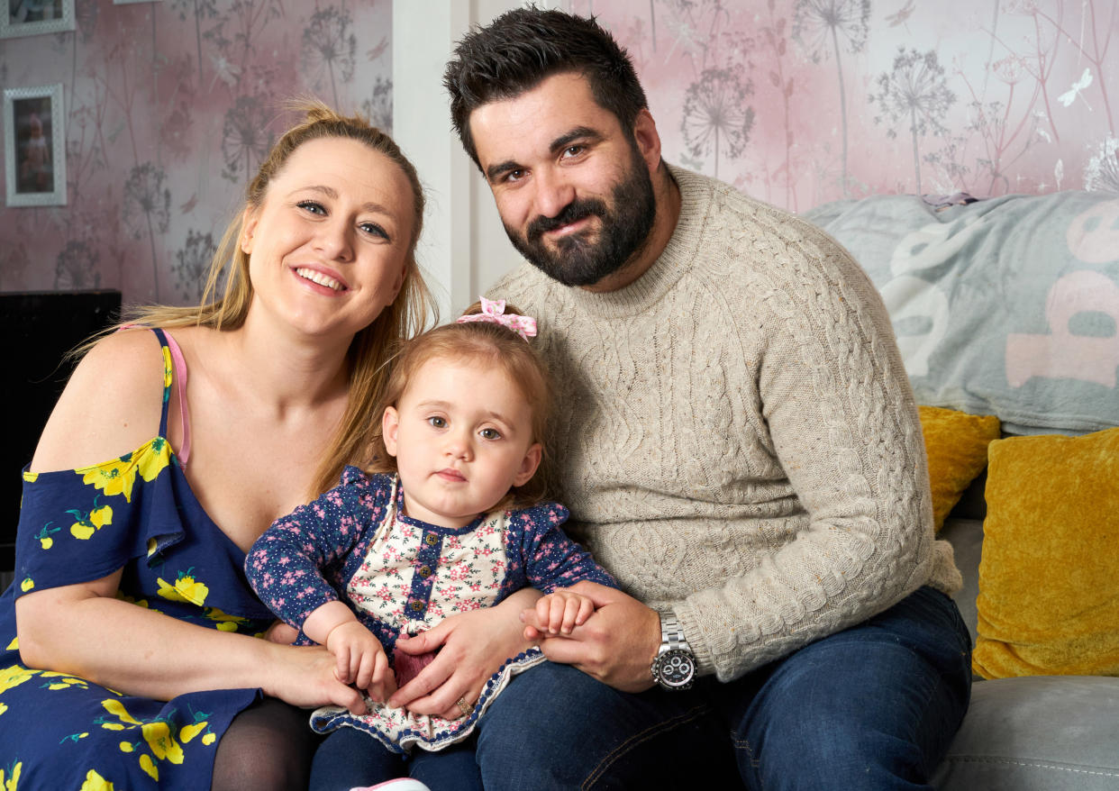 Bethan Simpson, 28, with husband Kieran Simpson, 30, and daughter Eloise Simpson. (Caters)