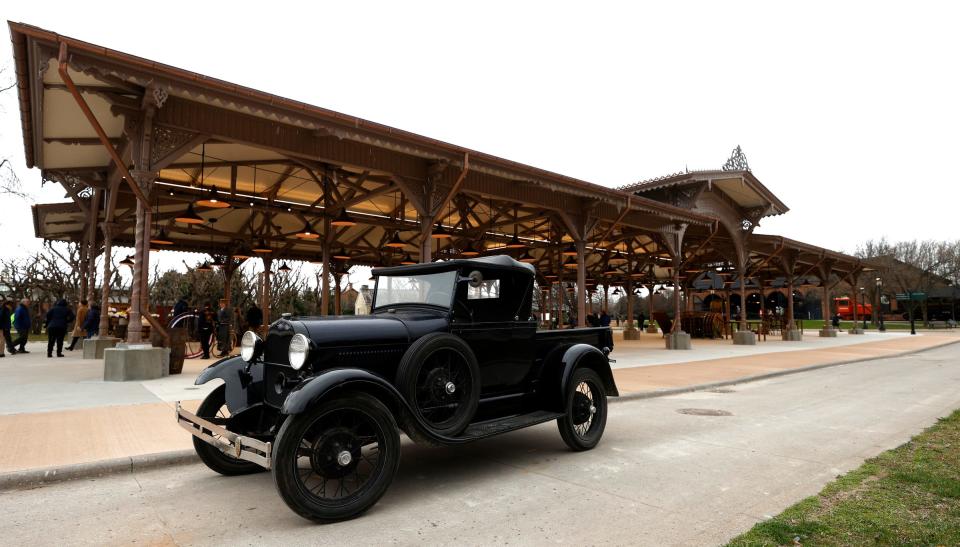 A Ford Model T is parked in front of the historic Detroit Central Market at Greenfield Village on Friday, April 15, 2022. The outdoor museum opens for the season this weekend.