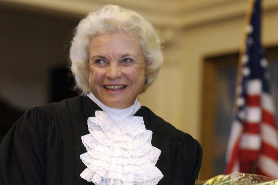 FILE - Supreme Court Justice Sandra Day O'Connor is shown before administering the oath of office to members of the Texas Supreme Court in Austin, Texas, on Jan. 6, 2003. For more than a decade, O'Connor was the only woman on the Supreme Court. And she was the first. Now the court has a record four. (AP Photo/Harry Cabluck, File )