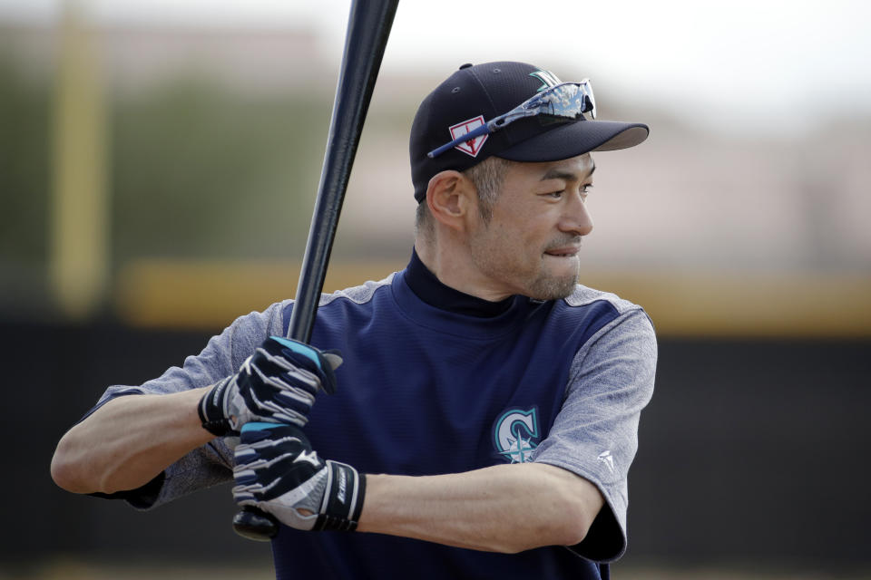 Seattle Mariners' Ichiro Suzuki waits to take batting practice during spring training baseball practice Saturday, Feb. 16, 2019, in Peoria, Ariz. (AP Photo/Charlie Riedel)