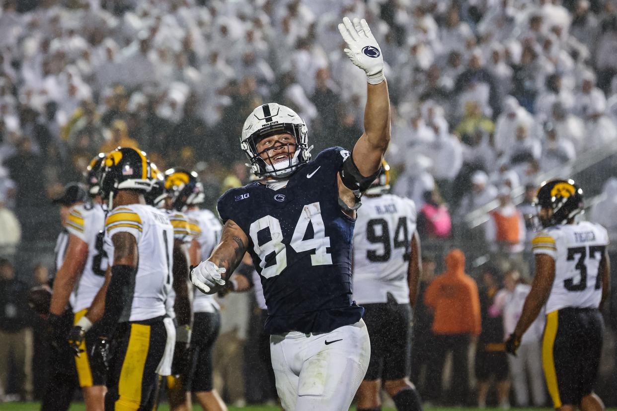 STATE COLLEGE, PA - SEPTEMBER 23: Theo Johnson #84 of the Penn State Nittany Lions waves to fans after a scoring play against the Iowa Hawkeyes during the second half at Beaver Stadium on September 23, 2023 in State College, Pennsylvania. (Photo by Scott Taetsch/Getty Images)