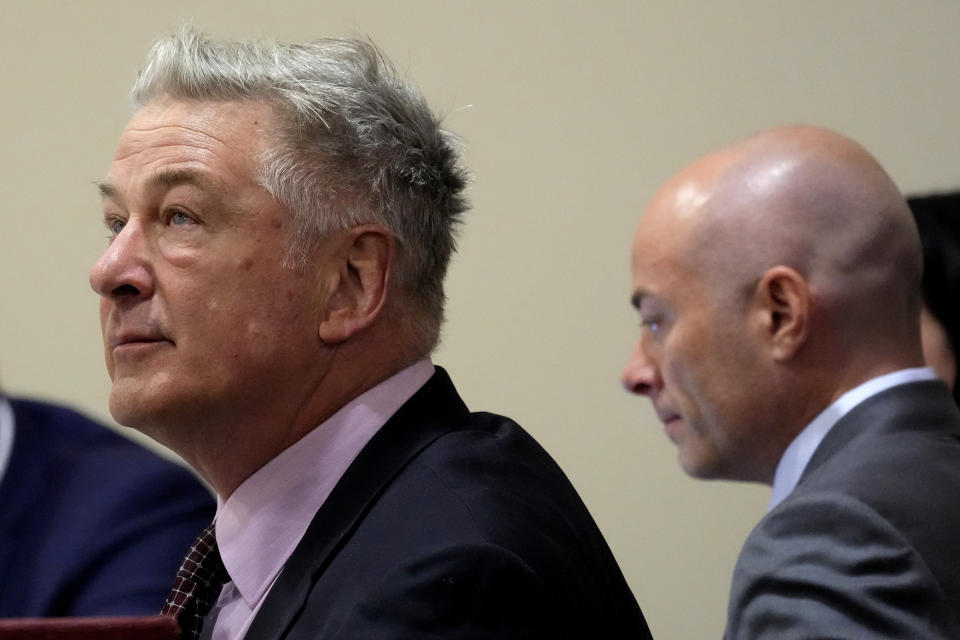 Actor Alec Baldwin, left, and attorney Luke Nikas listen during a hearing in Baldwin's involuntary manslaughter trial over a fatal shooting on the set of the film, "Rust," in District Court, in Santa Fe, N.M., Wednesday, July 10, 2024. (AP Photo/Ross D. Franklin, Pool)