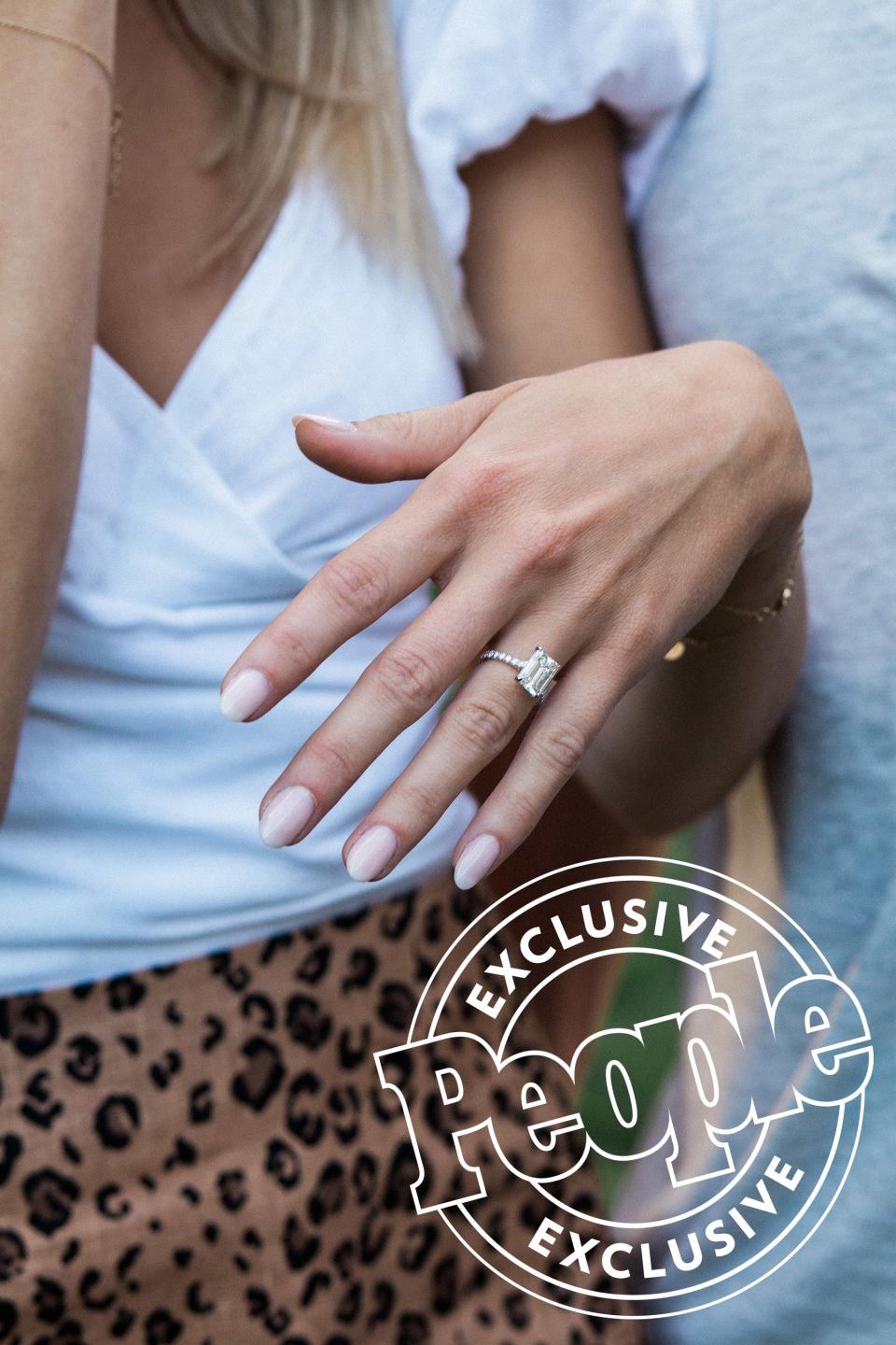 “Watching her try on rings, I learned she loves emerald-cut diamonds. I even heard her say that was the exact kind of ring she wanted. Thankfully she made it pretty easy to pick out!”