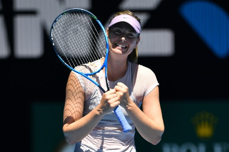 Russia's Maria Sharapova celebrates after beating Latvia's Anastasija Sevastova in their Australian Open second round match, in Melbourne, on January 18, 2018