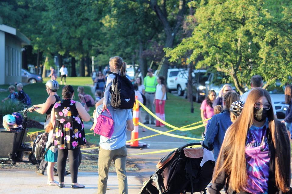 Students and parents arrive for the first day of the 2022-23 school year at Black River Public School.