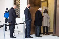 Former Fifa general secretary Jerome Valcke, center, arrives for the pronouncement of judgement at the Federal Criminal Court in Bellinzona, Switzerland, Friday, Oct. 30, 2020. Valcke is is accused of taking bribes, falsification of documents and aggravated criminal mismanagement. (Ti-Press/Alessandro Crinari/Keystone via AP)