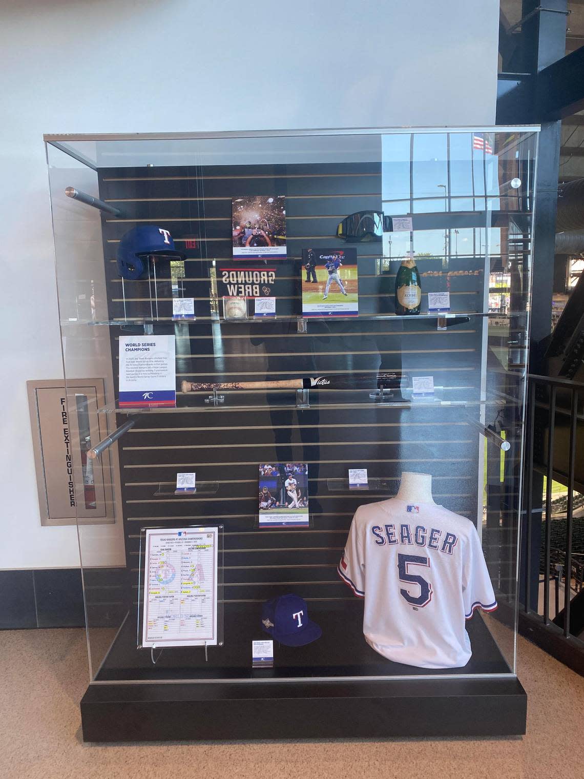 A display case with objects from the 2023 World Series. Lawrence Dow