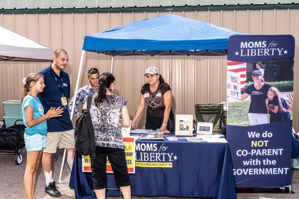 <span class="caption-text">A Moms for Liberty booth in Pennsylvania, on August 27, 2022</span><span class="credit"> Mark Peterson/Redux/for The New Republic </span>