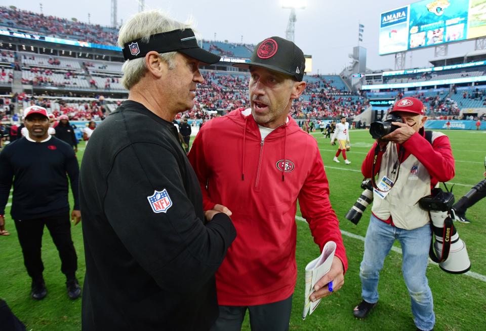 Jacksonville Jaguars head coach Doug Pederson shakes hands with San Francisco 49ers head coach Kyle Shanahan at midfield after the Jaguars defeat. The Jacksonville Jaguars hosted the San Francisco 49ers at EverBank Stadium in Jacksonville, FL Sunday, November 12, 2023. The Jaguars trailed 13 to 3 at the half and fell to the 49ers with a final score of 34 to 3. [Bob Self/Florida Times-Union]