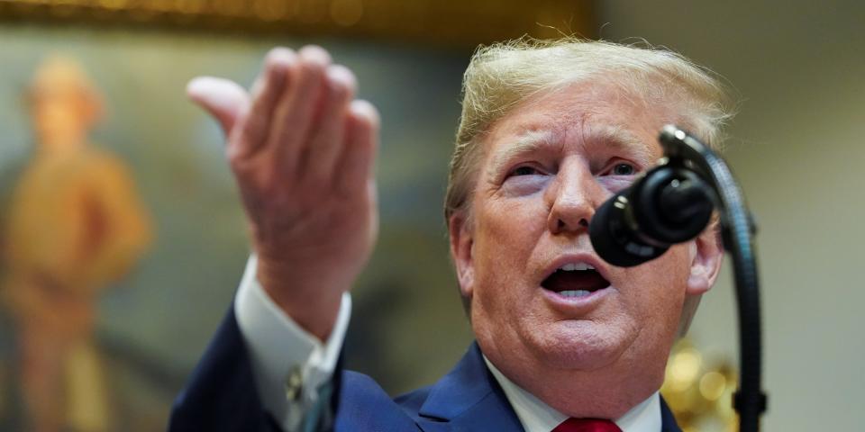 U.S. President Donald Trump answers questions from reporters about impeachment and Iran during an event to announce proposed rollbacks to the National Environmental Policy Act regulations in Roosevelt Room of the White House in Washington, U.S., January 9, 2020. REUTERS/Kevin Lamarque