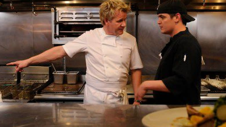 Ramsay speaking with kitchen staff 