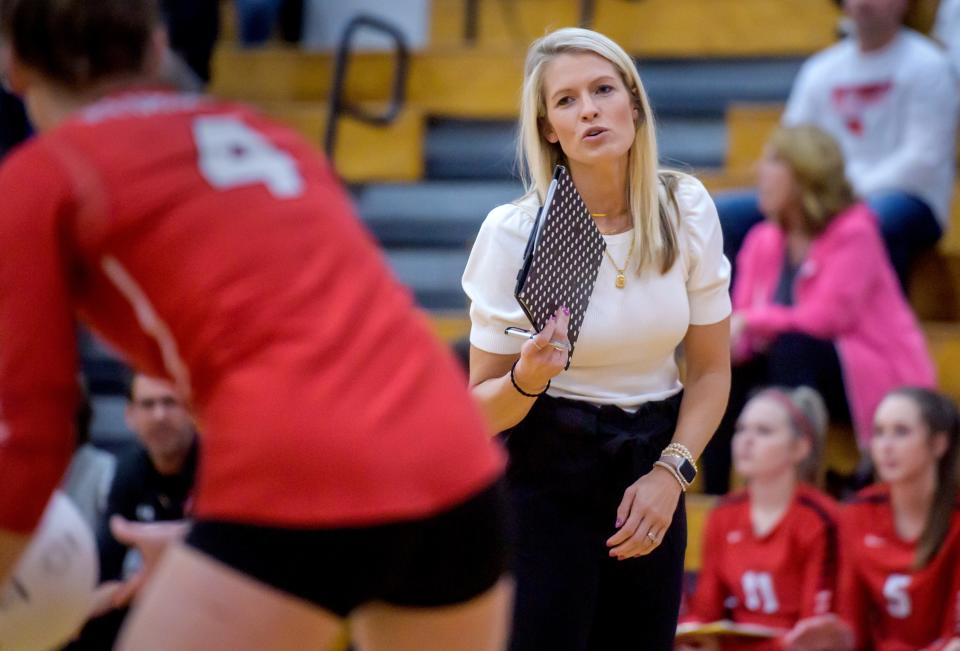 Metamora volleyball coach Tara Ballard gives some direction to senior setter Victoria Hall during their Class 3A volleyball regional title match Thursday, Oct. 27, 2022 in Metamora. The Redbirds defeated the Washington Panthers 25-12, 25-19.