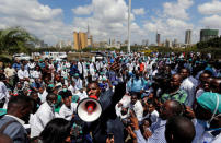 Ouma Oluga, Secretary-General of the Kenya Medical Practitioners, Pharmacists and Dentist Union (KMPDU), addresses doctors during a strike to demand fulfilment of a 2013 agreement between their union and the government that would raise their pay and improve working conditions outside Ministry of Health headquarters in Nairobi, Kenya December 5, 2016. REUTERS/Thomas Mukoya