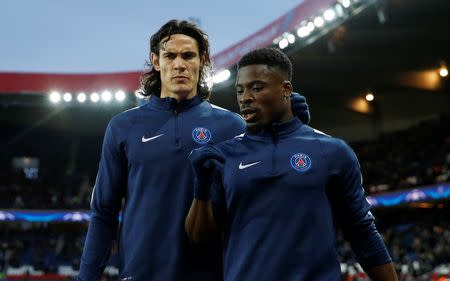 Football Soccer - Paris St Germain v Manchester City - UEFA Champions League Quarter Final First Leg - Parc des Princes, Paris, France - 6/4/16 PSG's Edinson Cavani and Serge Aurier warm up before the game Reuters / Benoit Tessier Livepic