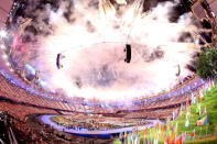 General View as fireworks illuminate the sky during the Opening Ceremony of the London 2012 Olympic Games at the Olympic Stadium on July 27, 2012 in London, England. (Photo by Ryan Pierse/Getty Images)