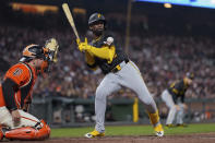 Pittsburgh Pirates' Andrew McCutchen, right, is hit by a pitch during the seventh inning of the team's baseball game against the San Francisco Giants, Friday, April 26, 2024, in San Francisco. (AP Photo/Godofredo A. Vásquez)