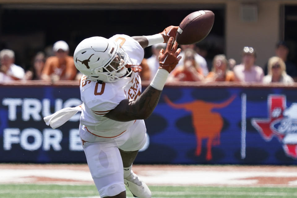 Apr 15, 2023; Austin, TX, USA; Texas Longhorns tight end Ja’Tavion Sanders (0) reaches for a pass during the first half of the Texas Spring Game at DKR- Texas Memorial Stadium. Mandatory Credit: Scott Wachter-USA TODAY Sports