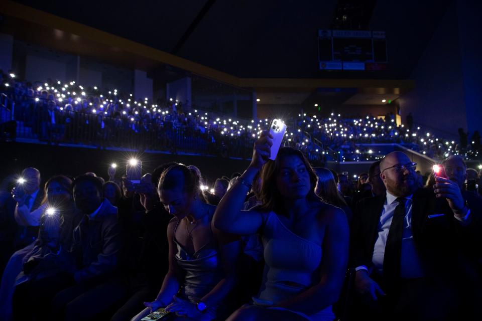The crowd turns on their phone flash lights before For King and Country's performance during the 54th annual Dove Awards at Lipscomb University in Nashville, Tenn., Tuesday, Oct. 17, 2023.