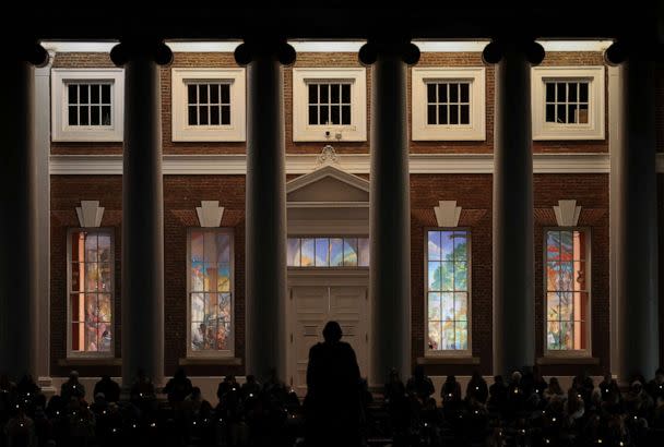 PHOTO: Members of the University of Virginia community attend a candlelight vigil on the South Lawn for the victims of a shooting overnight at the university, on Nov. 14, 2022 in Charlottesville, Va. (Win Mcnamee/Getty Images)