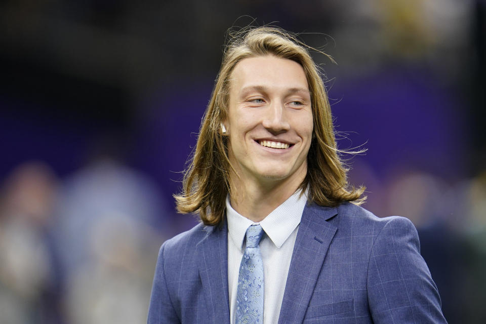 FILE - Clemson quarterback Trevor Lawrence arrives before the NCAA College Football Playoff national championship game against LSU in New Orleans, in this Monday, Jan. 13, 2020, file photo. Lawrence is a likely top pick in the NFL Draft, April 29-May 1, 2021, in Cleveland. (AP Photo/David J. Phillip, File)