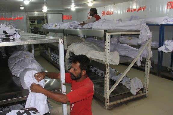 The dead bodies of heatwave victims at the Edhi Foundation morgue in Karachi, Pakistan on May 22, 2018.