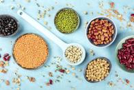 <p>If you want healthy probiotics, you need prebiotics to feed them. Prebiotics are a type of fiber that are not digested in the GI tract. They work to <a href="https://www.goodhousekeeping.com/institute/a26875/probiotics-and-prebiotics/" rel="nofollow noopener" target="_blank" data-ylk="slk:promote the growth;elm:context_link;itc:0;sec:content-canvas" class="link ">promote the growth</a> of good bacteria to help create a healthy gut environment that has less bloating. You can find prebiotics in veggies, fruit, nuts, beans, seeds and 100% whole grains, Fischer says.</p>