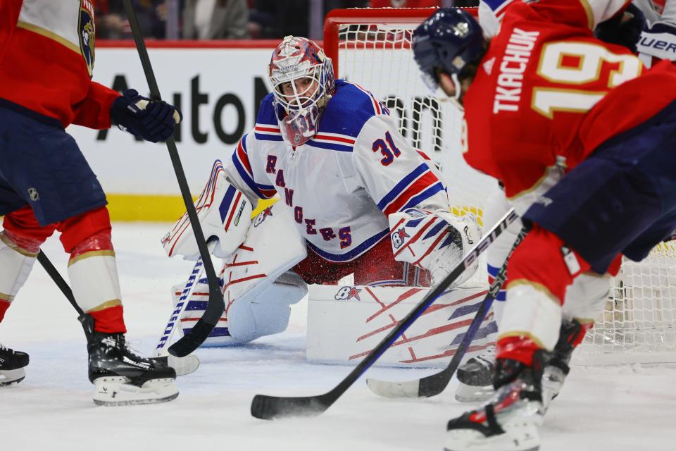 May 26, 2024; Sunrise, Florida, USA; New York Rangers goaltender Igor Shesterkin (31) defends his net against Florida Panthers left wing Matthew Tkachuk (19) during the first period in game three of the Eastern Conference Final of the 2024 Stanley Cup Playoffs at Amerant Bank Arena.