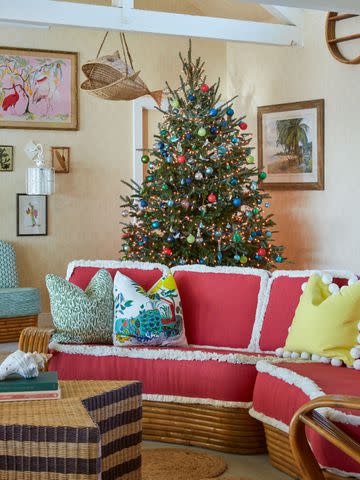 <p>PHOTOGRAPHS BY CARMEL BRANTLEY; STYLING BY PAGE MULLINS</p> Colorful ornaments abound on trees both inside and outside the inn.