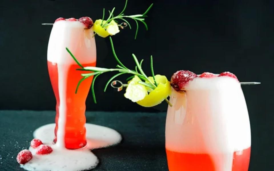 <p>Sally Pasley Vargas</p><p>This ruby-tinted spin on the classic cocktails serves one, but for a crowd, you can scale up on the ingredients and chill. Top with cold Champagne just before serving.</p><p><strong>Get the recipe: <a href="https://parade.com/608949/alison-ashton/cranberry-french-75/" rel="nofollow noopener" target="_blank" data-ylk="slk:Cranberry French 75;elm:context_link;itc:0;sec:content-canvas" class="link ">Cranberry French 75</a></strong></p>