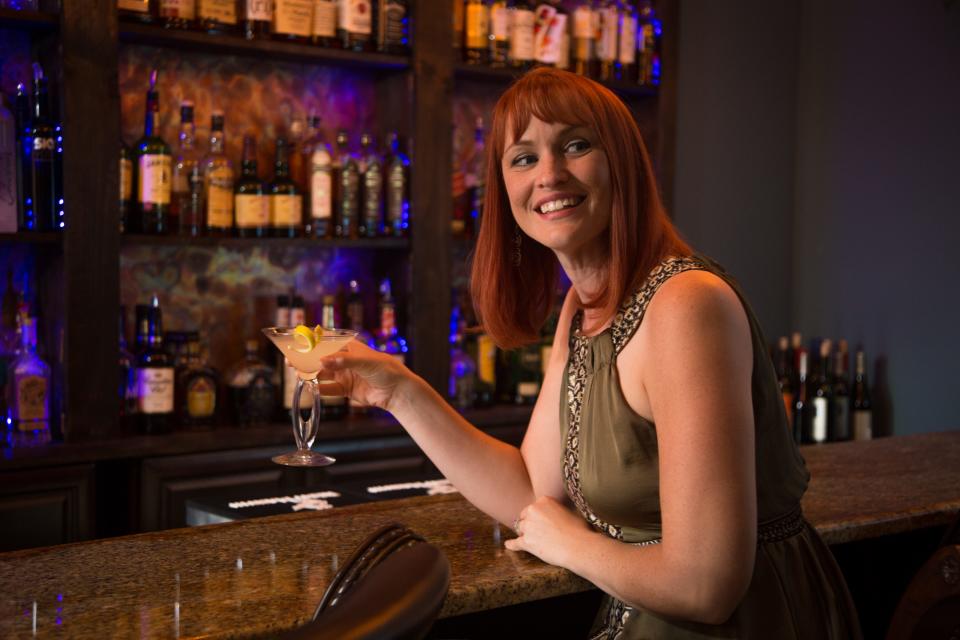 Megan Litras of Café Margaux samples one of the restaurants special “Bar Events” cocktails.