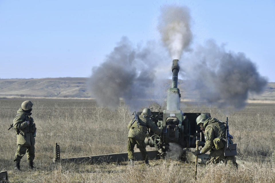 A Russian artillery unit fires a D-30 howitzer toward Ukrainian positions on Jan. 26, 2023. (RIA Novosti / Sputnik via AP)