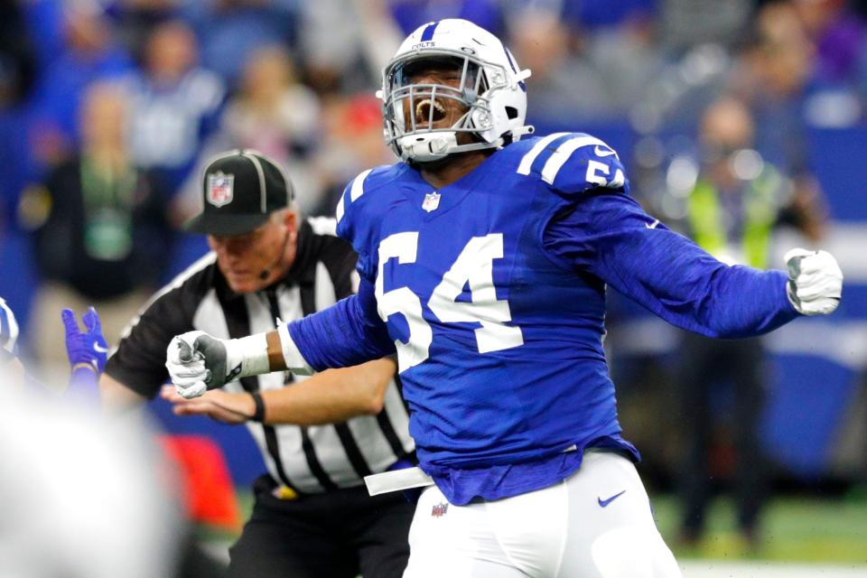 Indianapolis Colts defensive end Dayo Odeyingbo (54) celebrates after sacking Jacksonville Jaguars quarterback Trevor Lawrence (16) on Sunday, Nov. 14, 2021, during a game against the Jacksonville Jaguars at Lucas Oil Stadium in Indianapolis.