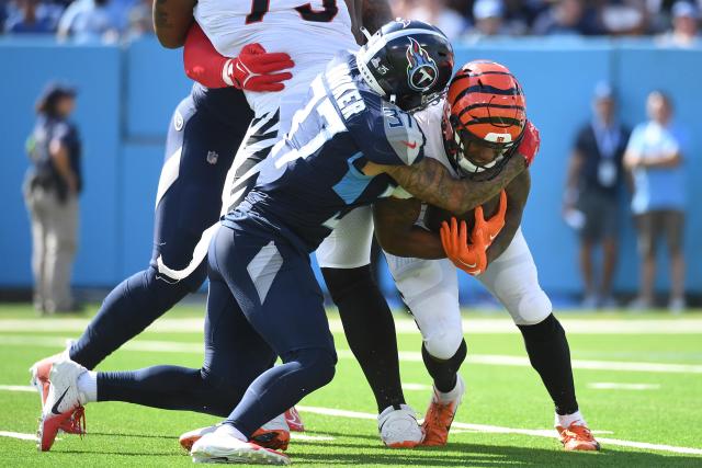 Derrick Henry bulldozes Bengals defense for TD, then throws for