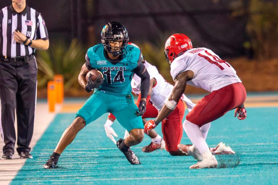 Coastal’s Jared Brown faces off against Jacksonville State defenders after receiving a pass on Saturday. Coastal Carolina University takes on Jacksonville State in the chanticleers first home game of the 2023 football season. Sept. 9, 2023.