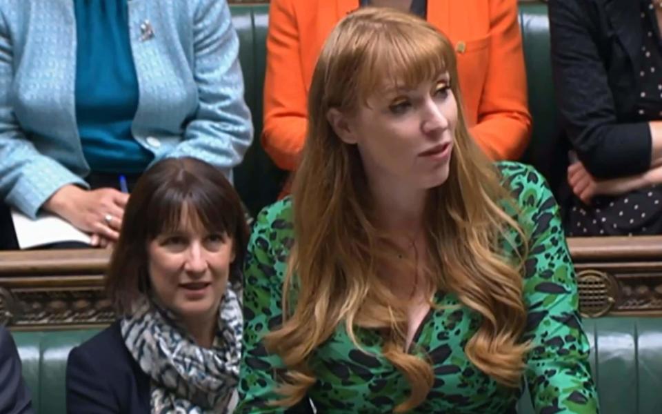 Angela Rayner, the deputy Labour leader, is pictured during PMQs in the House of Commons today - PA